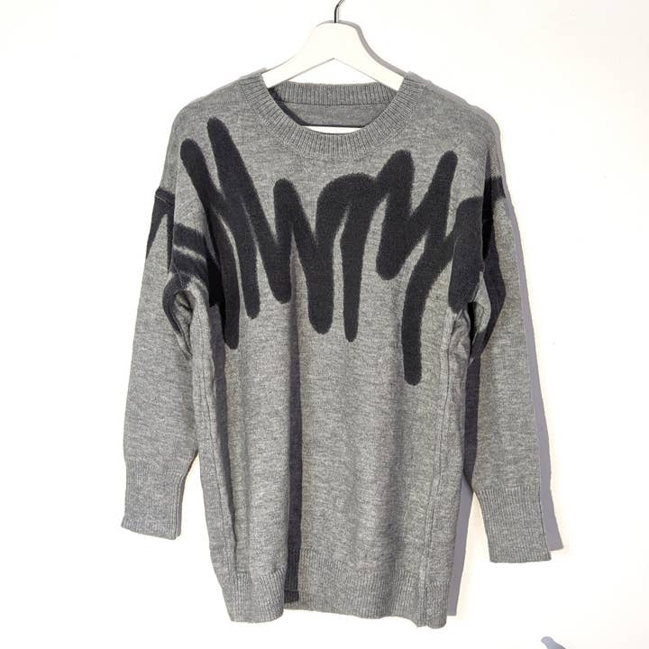 Graffiti spray effect design jumper for wholesale by Tempest Designs