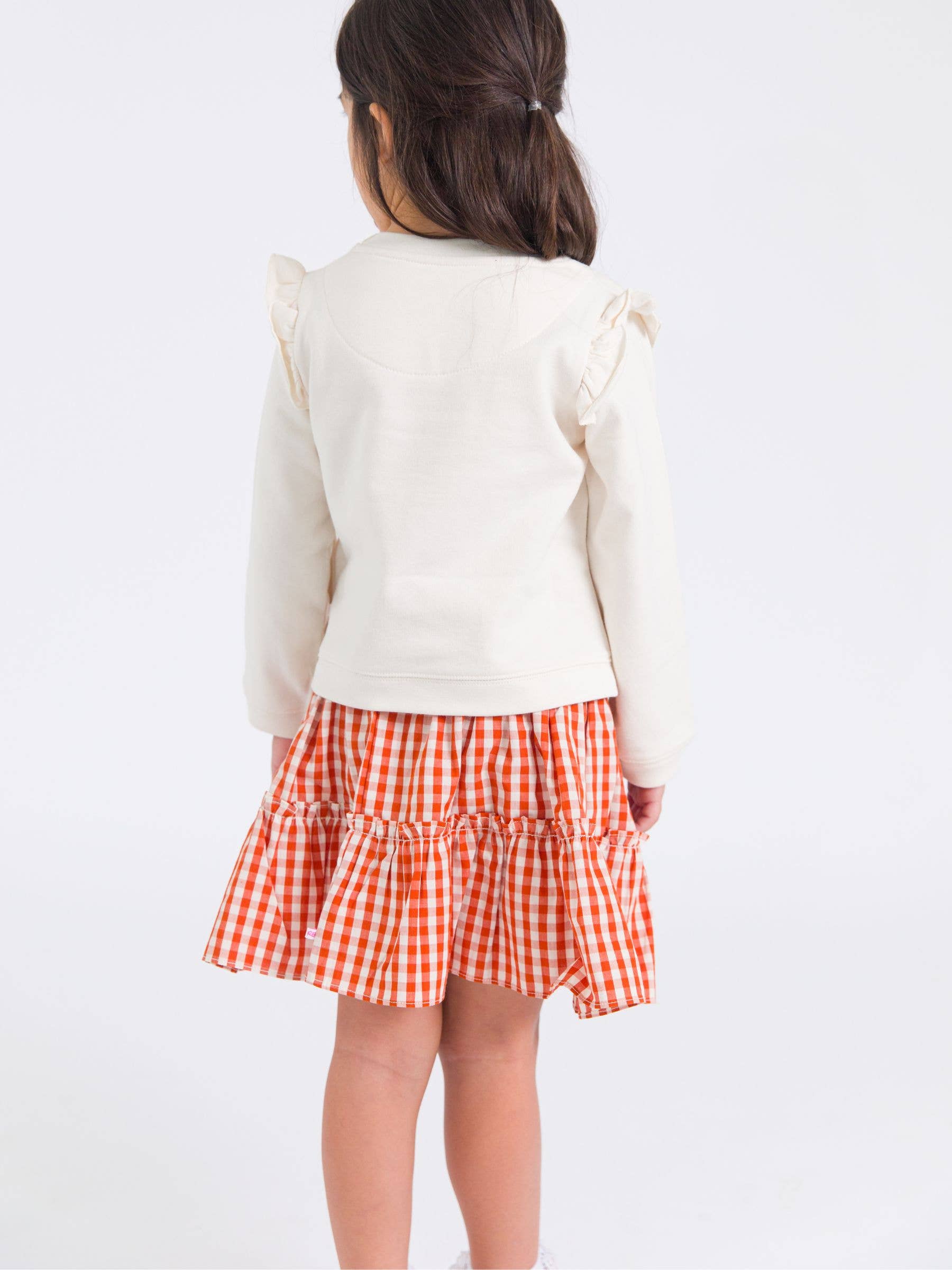 Orange Girls Classic Rust Gingham Smocked Twirl Skirt for wholesale on Faire3