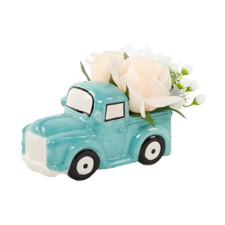 Faux Floral in 6.5" Blue Ceramic Truck for wholesale by Flora Bunda Inc