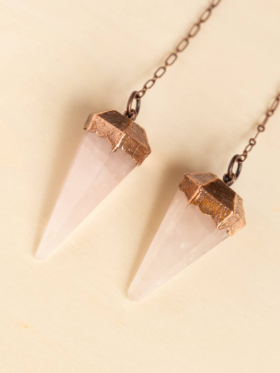 The Cyprus Cabinet - Wholesale Spiritual Stone/Crystal - Rose Quartz Copper + Crystal Pendulum3