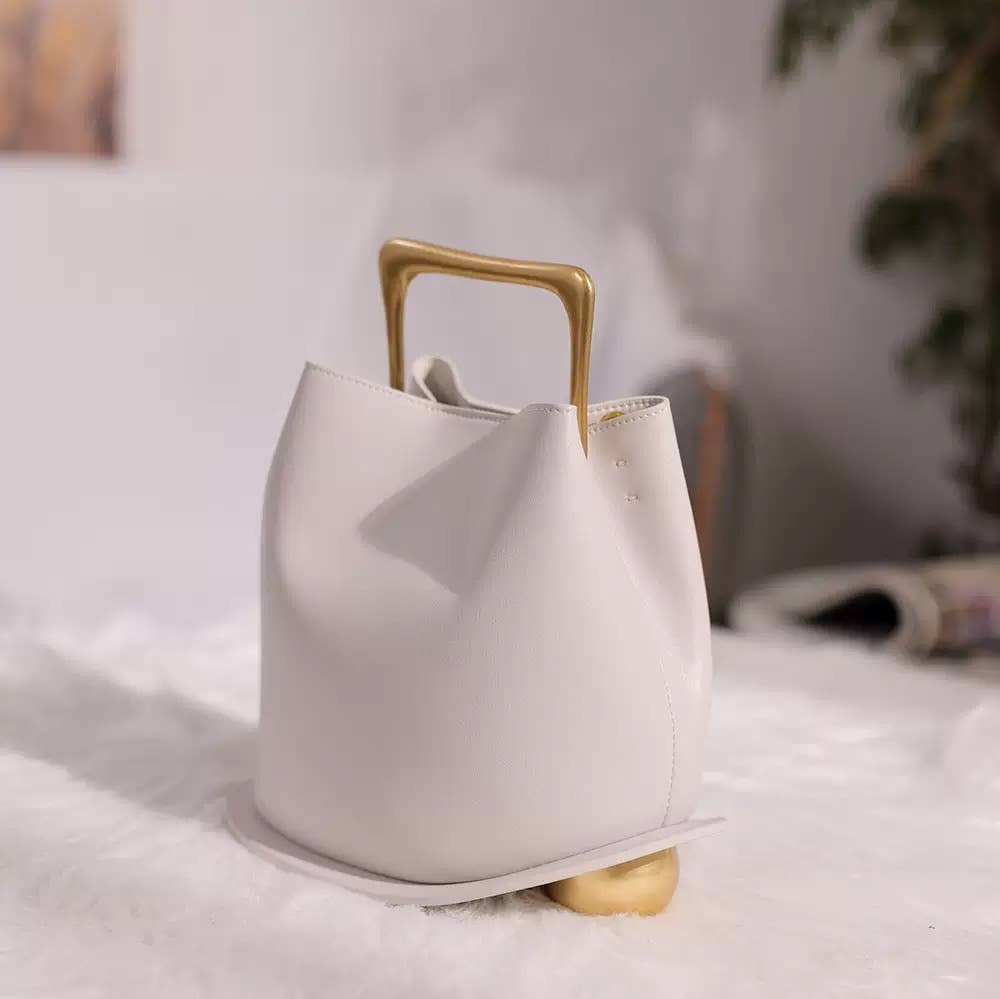 Sook Stainable – wholesale Top handle bag – women's – Geometric Artistic Design Metal Handle Leather Bag6