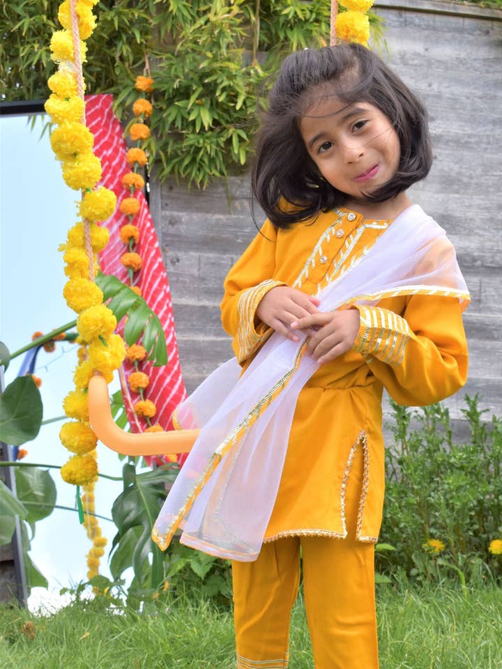 Manjal suit for little girls for wholesale by House of Amaya