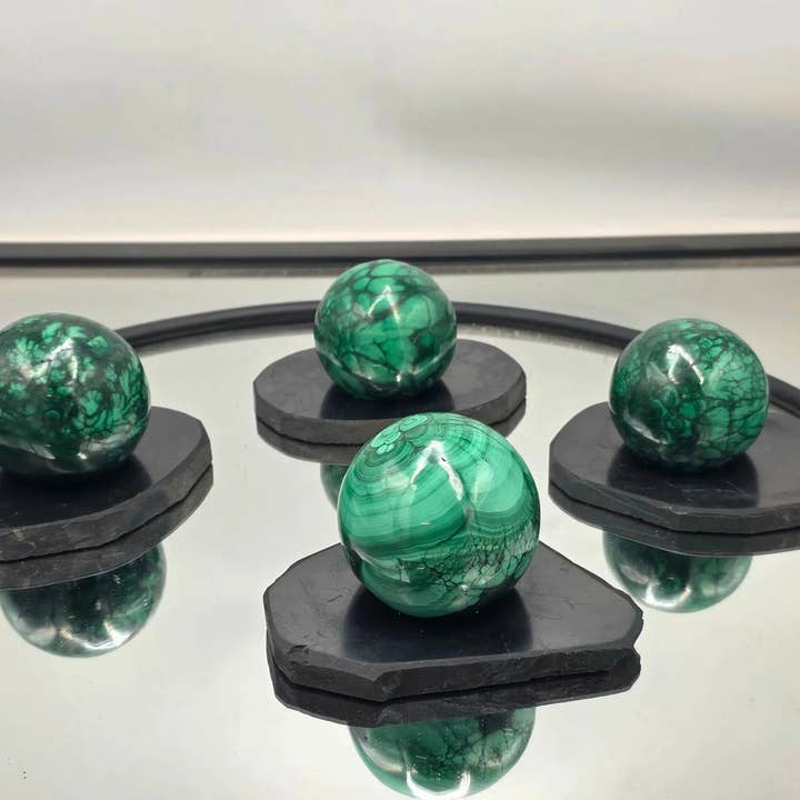 Distinction Crystals - Wholesale Spiritual Stone/Crystal - Shungite Crystal Sphere Holder