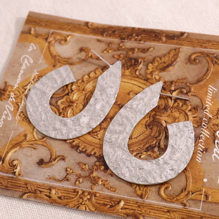 Ovale sølvøreringe med børstet effekt for engroshandel hos joya