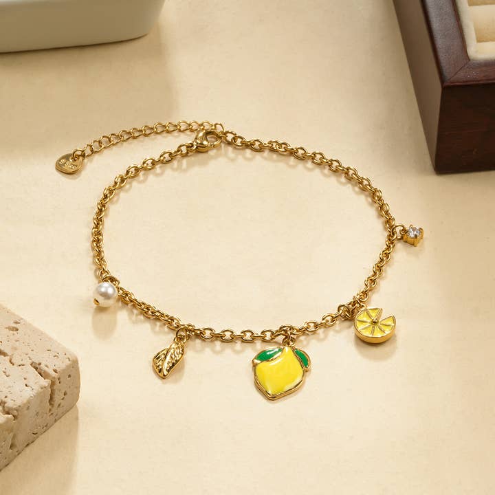 Fotlänk med 5 gula citronberlocker för wholesale av joya