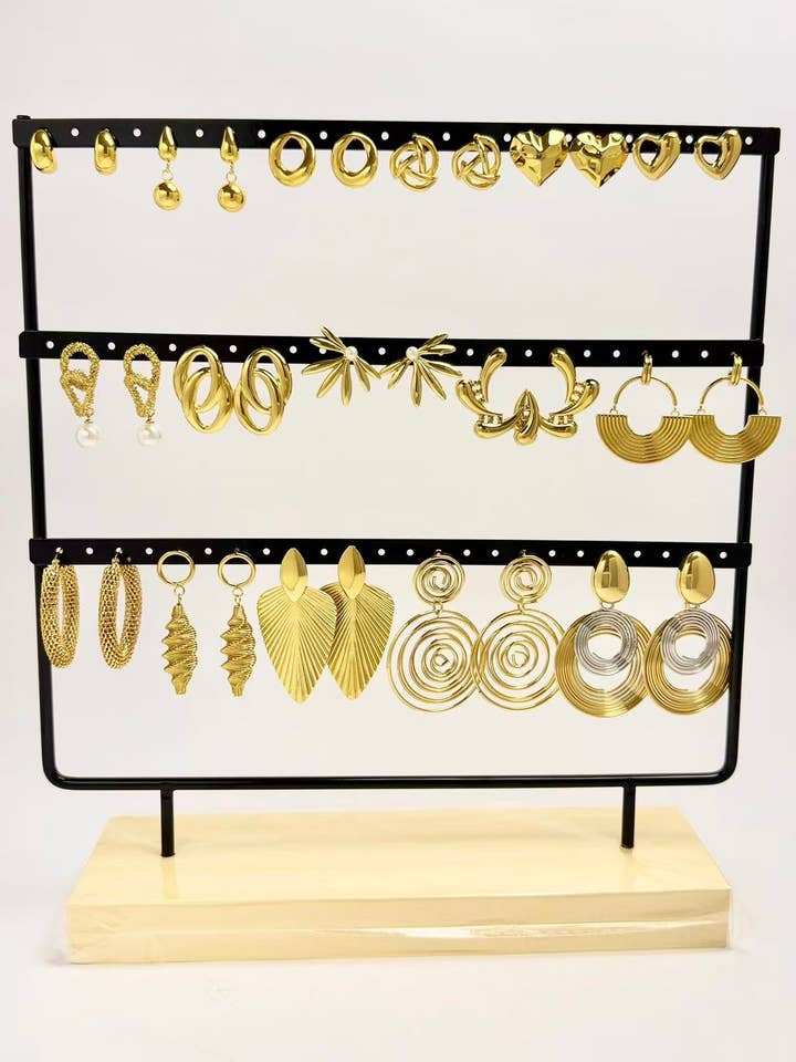 Set of 16 pairs of trendy original golden earrings for wholesale by COSMOS
