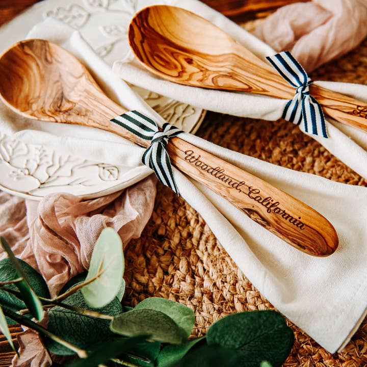 Custom City Name Olive Wood Serving Spoon & Towel Gift Set and other Purchase Wholesale customnotepads. Free Returns & Net 60 Terms on Faire trending on Faire.