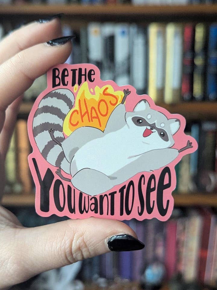 Be the Chaos chaotic raccoon vinyl sticker for wholesale by Geek and Artsy
