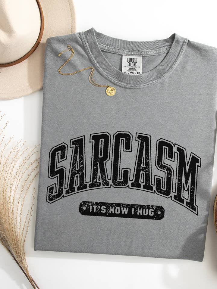 Sarcasm It's How I Hug Graphic Tee for wholesale by CMD Wholesale
