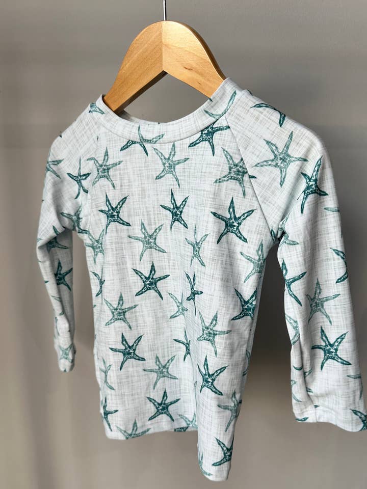 The “Jordan” Rashguard for wholesale by Current Tyed Clothing