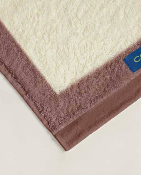 Creme de Caramelo Cosmic Toalha de Banho 30X50 Cm Coleção Têxtil para venda a revendedores na Faire1