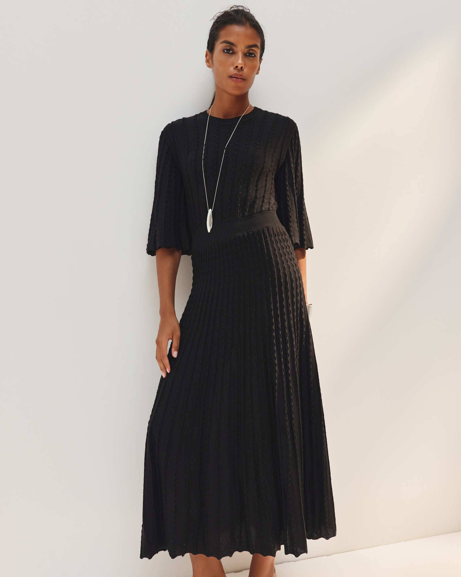 Nenya Fashion Limited – wholesale Dress – Women's – Estelle Openwork Knit Dress with Flared Sleeve5