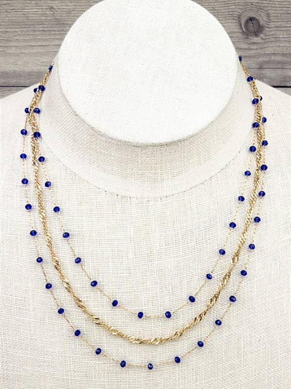 COLLIER À COUCHES AVEC PERLES EN VERRE FACETTÉES pour la vente par Andrea Bijoux