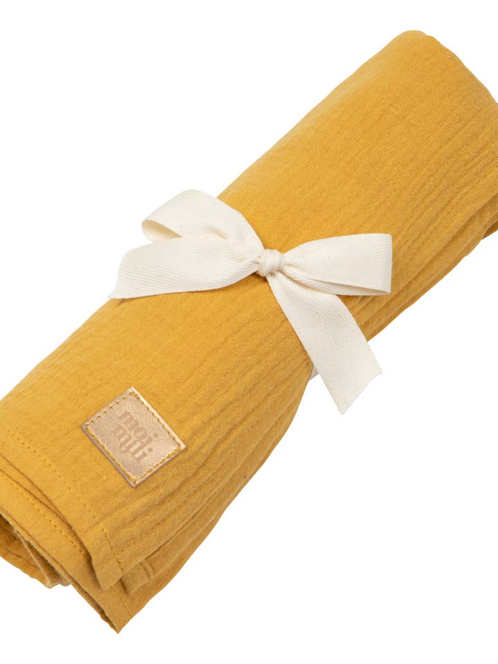 Couverture d'emmaillotage en mousseline pour bébé
« Ocre » pour la vente par Moi Mili