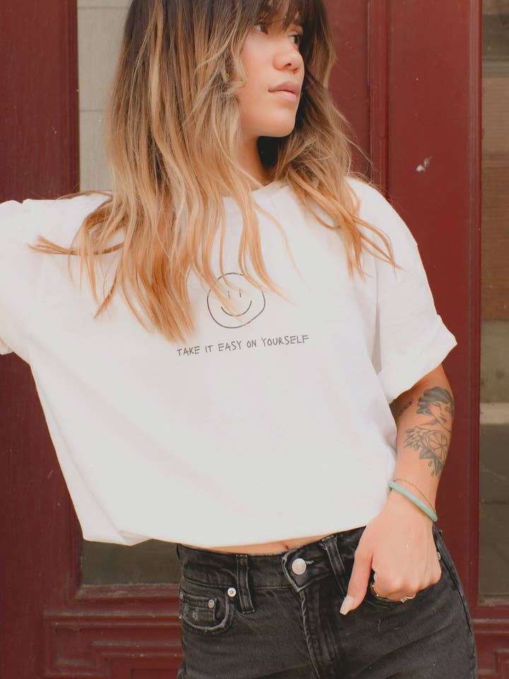 Take It Easy | Don't Trip Over What's Behind You Tee for wholesale by Maneki