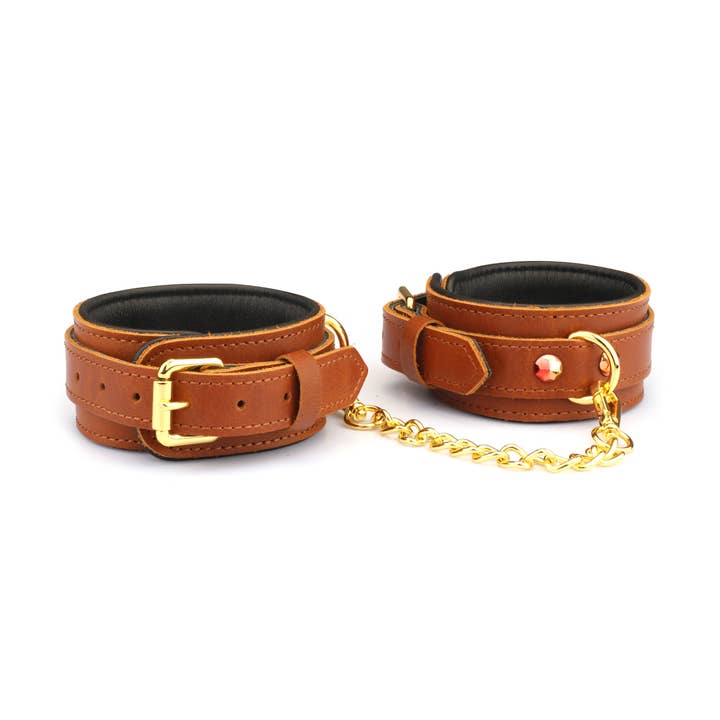 Luxuriöse Handschellen aus orangefarbenem Leder mit orangefarbenen Nieten für den Großhandel von Liebe Seele