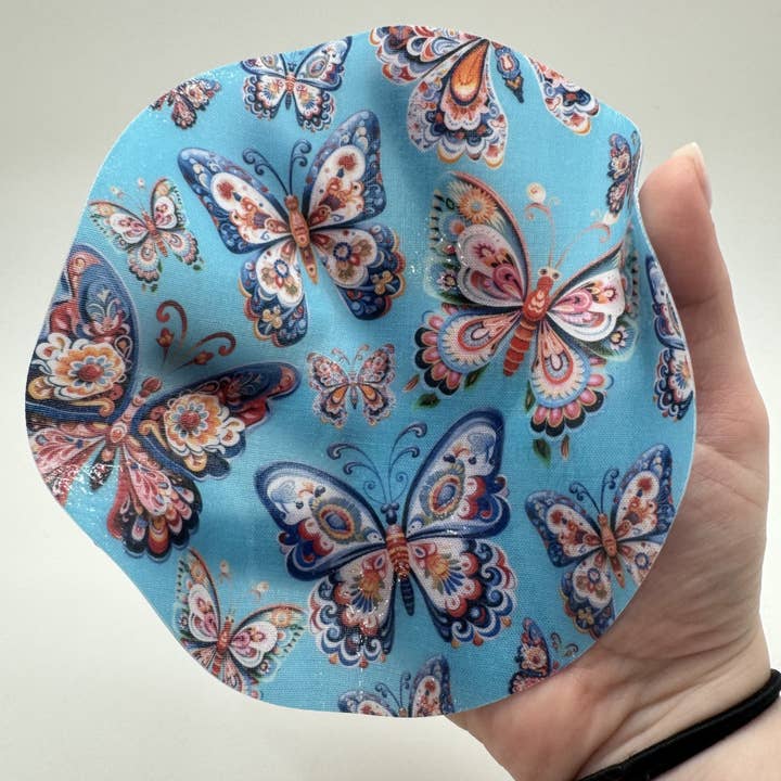 Andreas - Vente Ouvre-bocal - Papillon bleu sarcelle