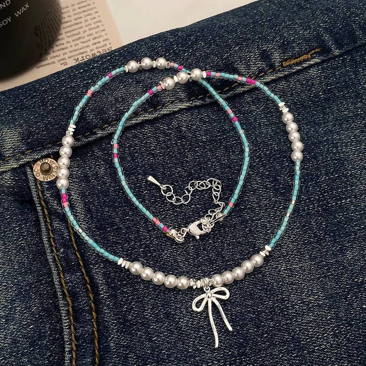 HIGH-END LUXURY BOW PENDANT NECKLACE FOR WOMEN_CWAJE3064 for wholesale by ACCITY