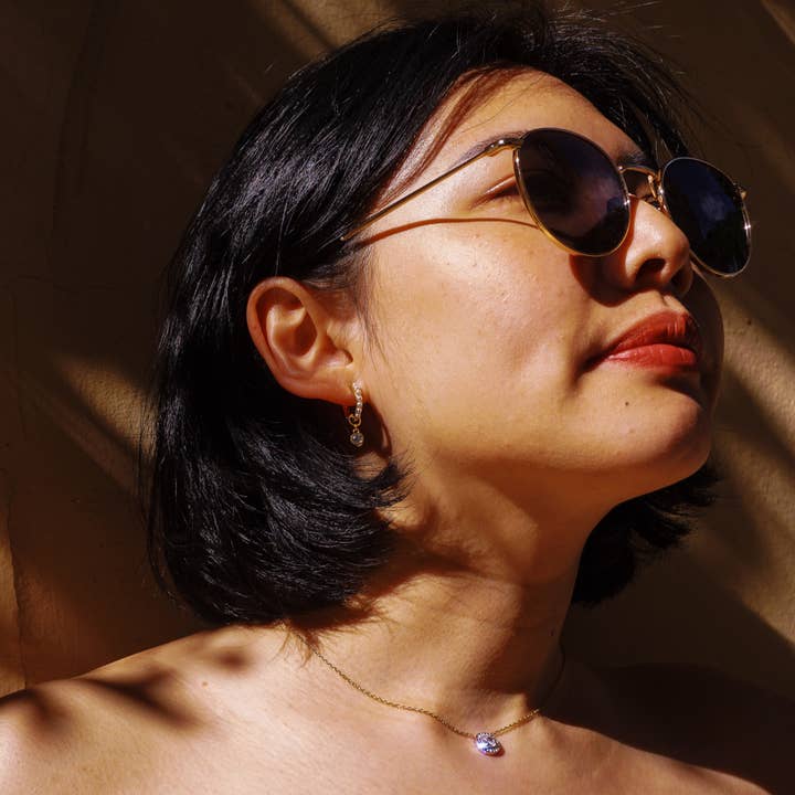 Gold Adelina white earrings for wholesale on Faire3