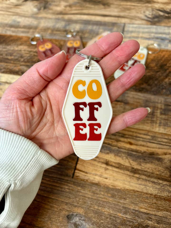 Coffee motel keychain for wholesale by Axle Rose Co