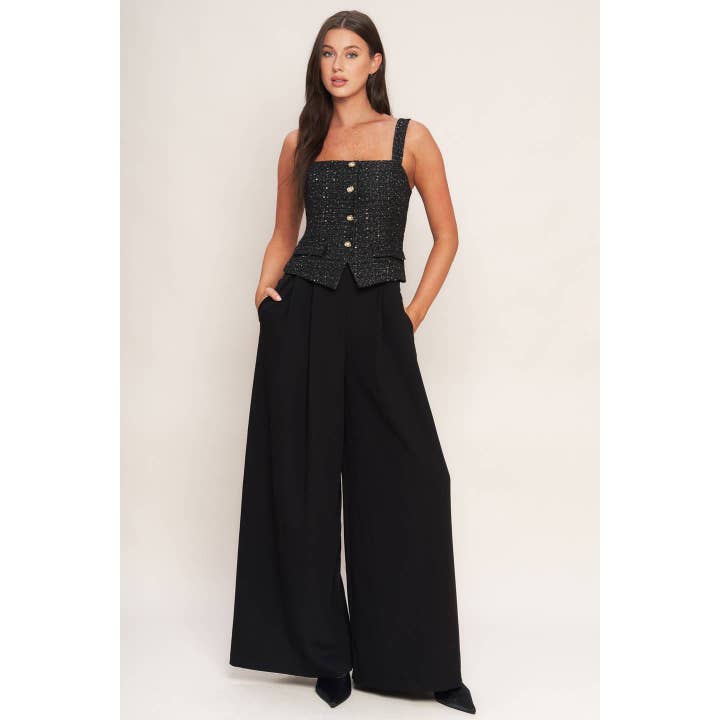 A woven jumpsuit - IP9074 and other Purchase Wholesale cocopup. Free Returns & Net 60 Terms on Faire trending on Faire.