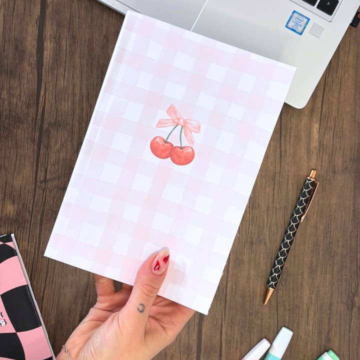 Handmade A5 Pink Check Notebook With Cherry Bow & Dot Grid for wholesale by Wonky Paper Co