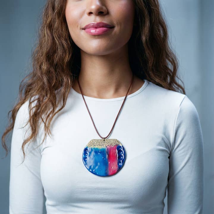 Abstract Blue Circle Pendant Necklace Handmade for wholesale by Sassy Sacha Jewelry