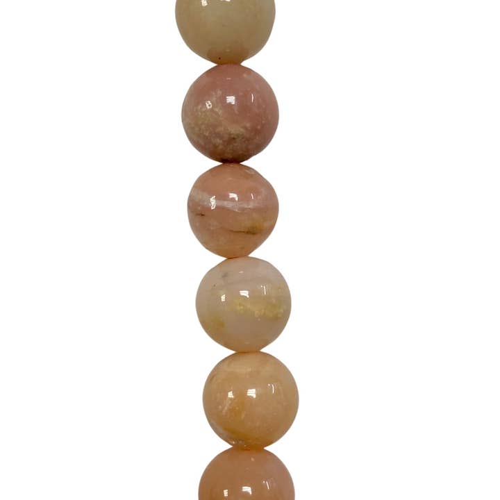 Pink Opal - (Polished) - Round/ Smooth for wholesale by The Bead District