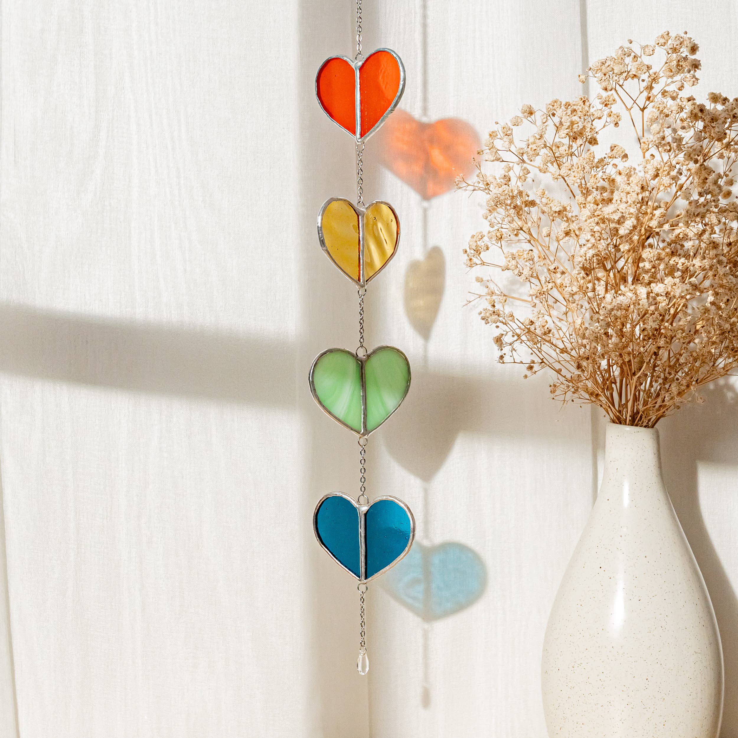 MondoBellissimo - Vendita all'ingrosso Bandierine/Ghirlande - Ghirlanda a cuore in vetro colorato F227