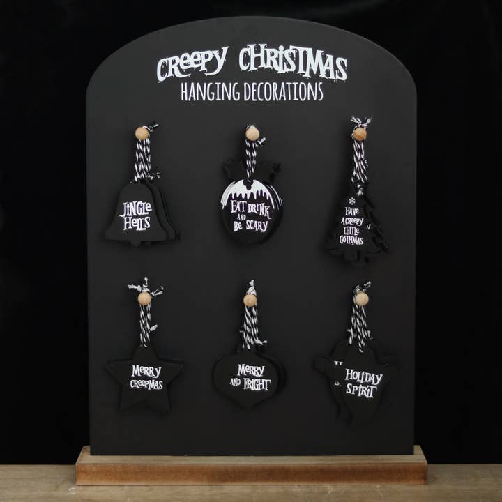 Set of 36 Creepy Gothic Christmas Hanging Signs on Display for wholesale by Something Different Wholesale