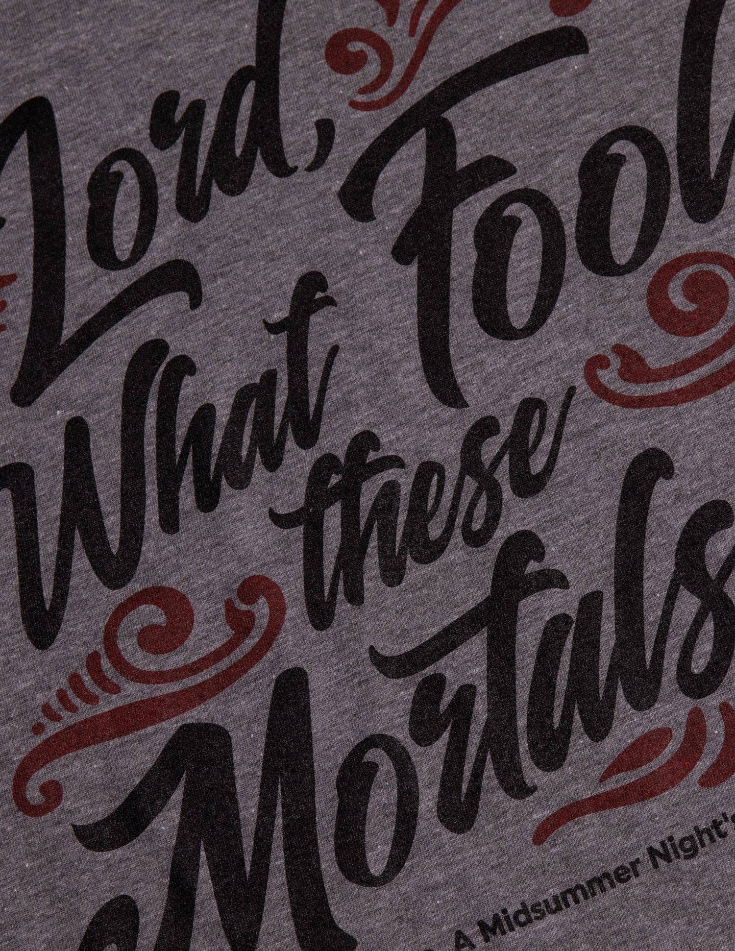 Gelo Grigio Maglietta scollata a V da donna con citazione letteraria divertente in vendita all'ingrosso su Faire3