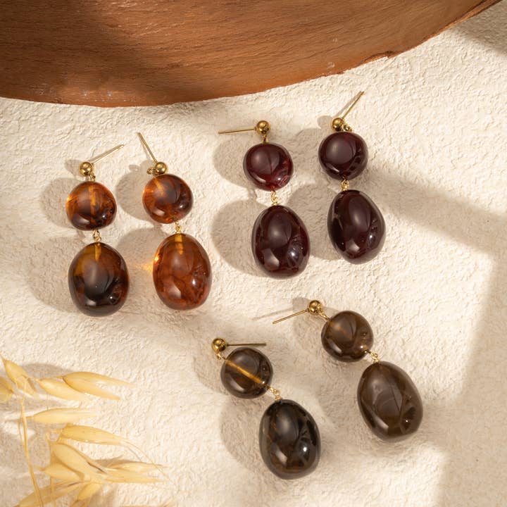 Brown chocolate burgundy marbled resin earrings for women and other Purchase Wholesale chocolate drops. Free Returns & Net 60 Terms on Faire trending on Faire.