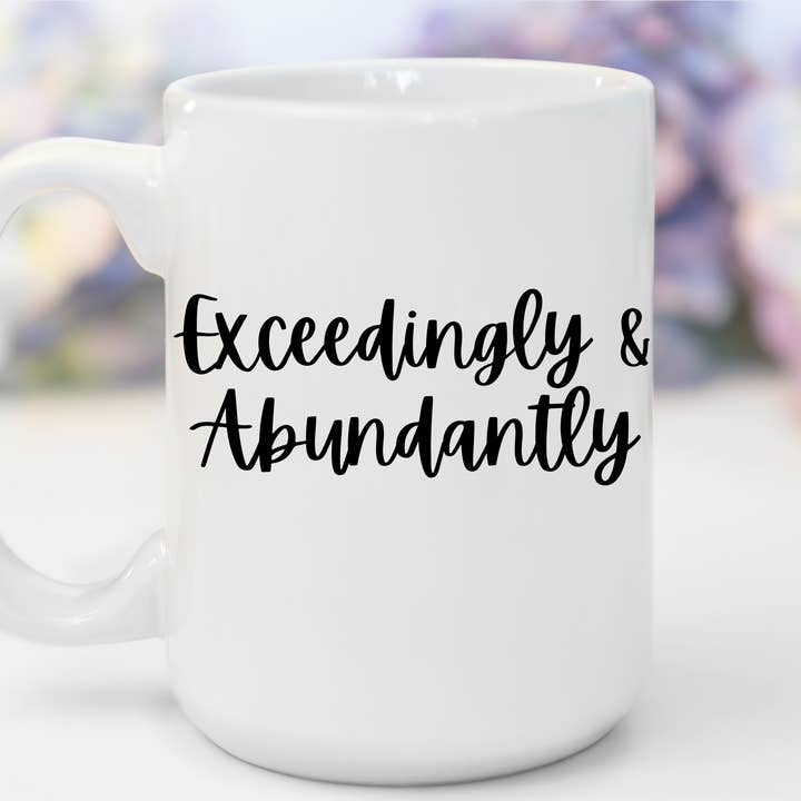 "Exceedingly & Abundantly" White Gloss Ceramic Mug 15oz | Jesus Collection by Love Tiffany for wholesale by LOVE TIFFANY