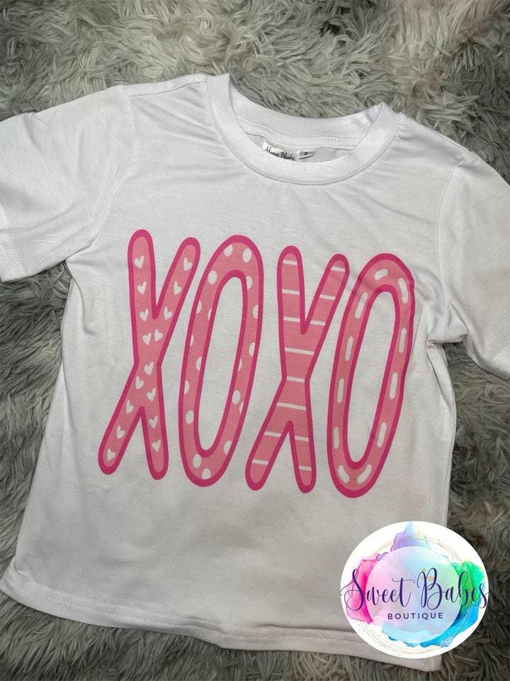 Xoxo Valentine’s Day graphic tee for wholesale by Sweet Babes Boutique