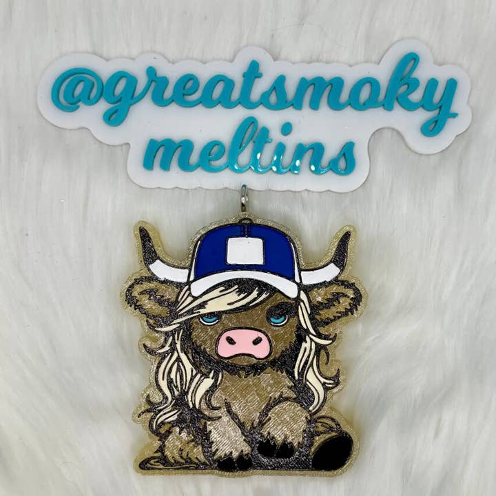 Great Smoky Meltin’s, LLC - Wholesale Car Freshener - Unisex - Highland Cow Trucker Hat Car Freshie