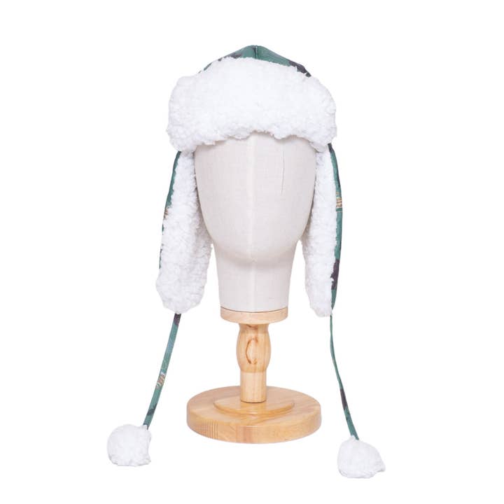 The Cozy Trapper Hat – Camping Trails Print with Coconut White Sherpa Liner & Pompoms for wholesale by Mimish