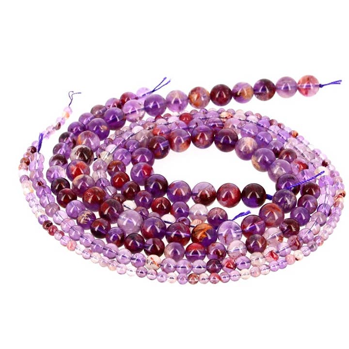 Artisans de Madagascar - Vente Perle - Perles Super Seven EXTRA (cacoxenite ou cacochynite)