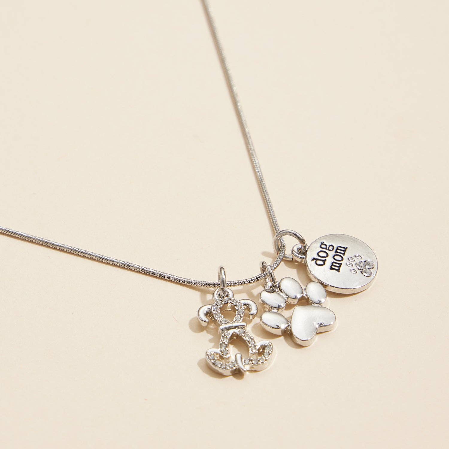 Dog Lover Charm Necklace – Gold Dipped Paw Pendant for wholesale on Faire3