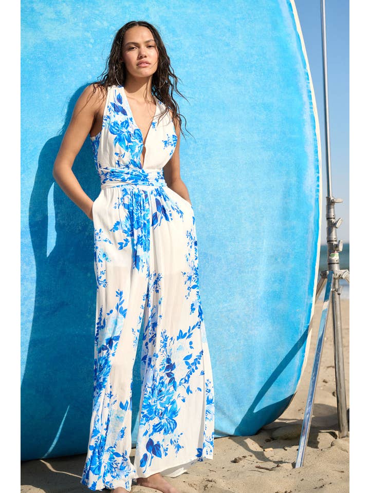 Off White Blue Plunging Neck Floral Woven Jumpsuit for wholesale on Faire