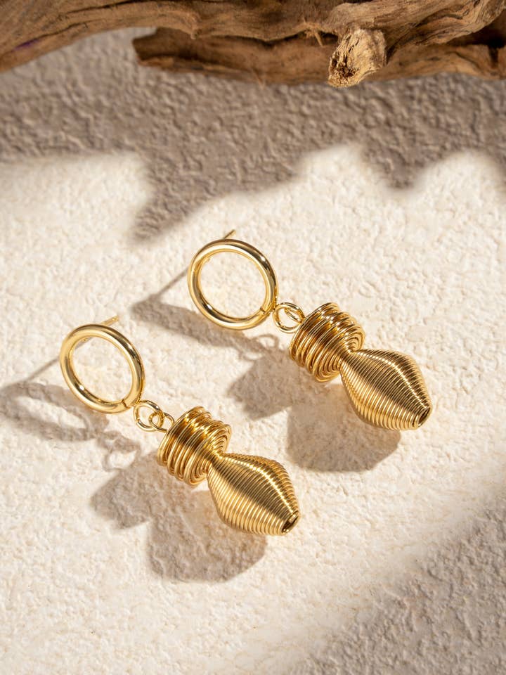 Twisted gold stainless steel earrings style for wholesale by COSMOS