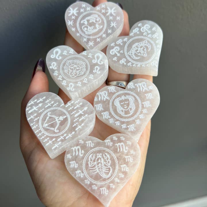 Sapphire & Sage - Wholesale Spiritual Stone/Crystal - Selenite Etched Zodiac Heart Crystal Carving