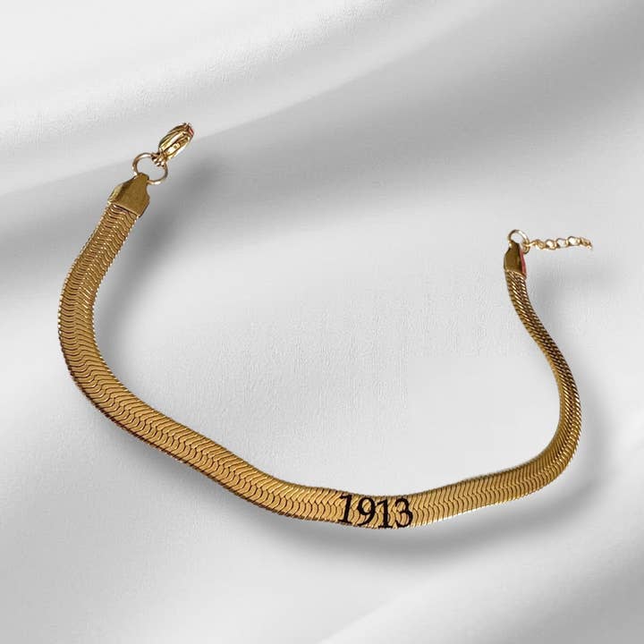 1913Engraved Gold Stainless Steel Herringbone Bracelet – DST Gift for wholesale by BLK Confetti