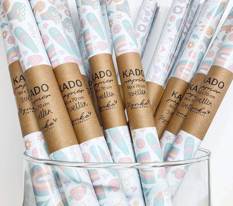 NynkeOntwerpt – Engroshandel Gavepapir – Indpakningspapir med solnedgangs-doodles | Egen illustration1