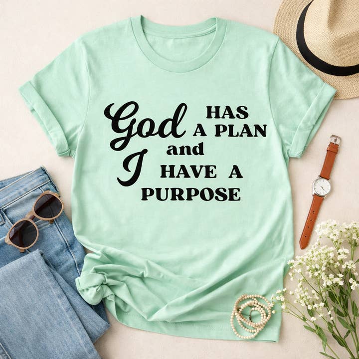 God Has a Plan and I Have a Purpose Tee | Christian Faith Graphic T-Shirt for wholesale by Rose’s Colored Designs