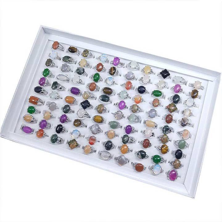 Genuine Semi Precious Gemstone Ring Set -100 Pcs and other Purchase Wholesale kristallen. Free Returns & Net 60 Terms on Faire trending on Faire.