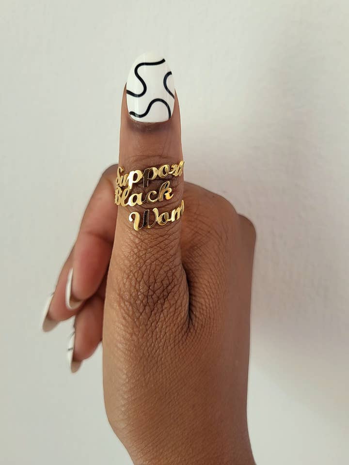 Anello placcato in oro 18K "Supporta le donne nere" per la vendita all'ingrosso da parte di Moon Goddess