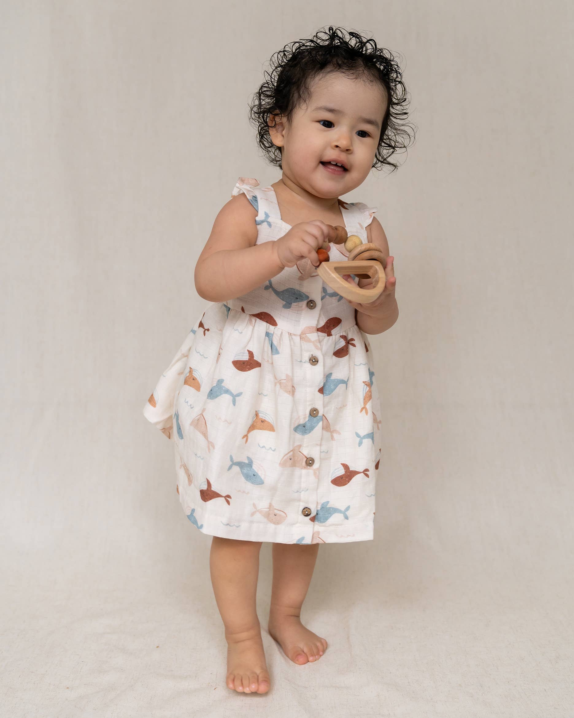 Natural Whales Ruffle & Button Baby Dress+Bloomer (Organic Muslin) for wholesale on Faire1