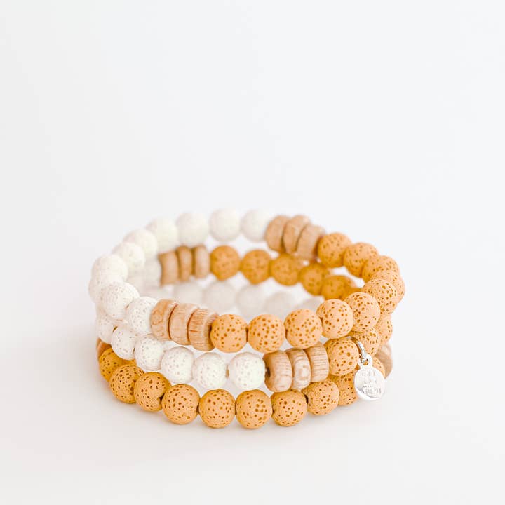 Ying-Yang Yellow & White Lava Stone Diffuser Bracelet for wholesale by You Can Call Me YOKO LLC