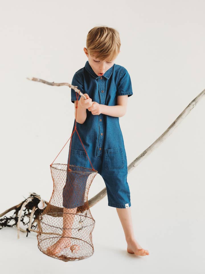 Salopette courte en denim bleu pour la vente par Turtledove London