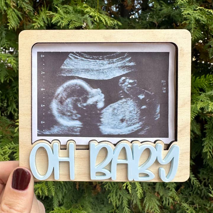 "Oh Baby" Announcement Magnet, Sonogram Holder Magnet and other Purchase Wholesale ultrasound frame. Free Returns & Net 60 Terms on Faire trending on Faire.